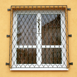Wrought-iron grilles Waves on the window with a snake in the middle  Levoa pharmacy