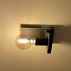 Adesigner wall mounted lamp was created by the connection of modern and traditional