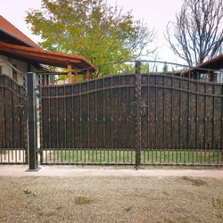 A full wrought iron gate - a cottage